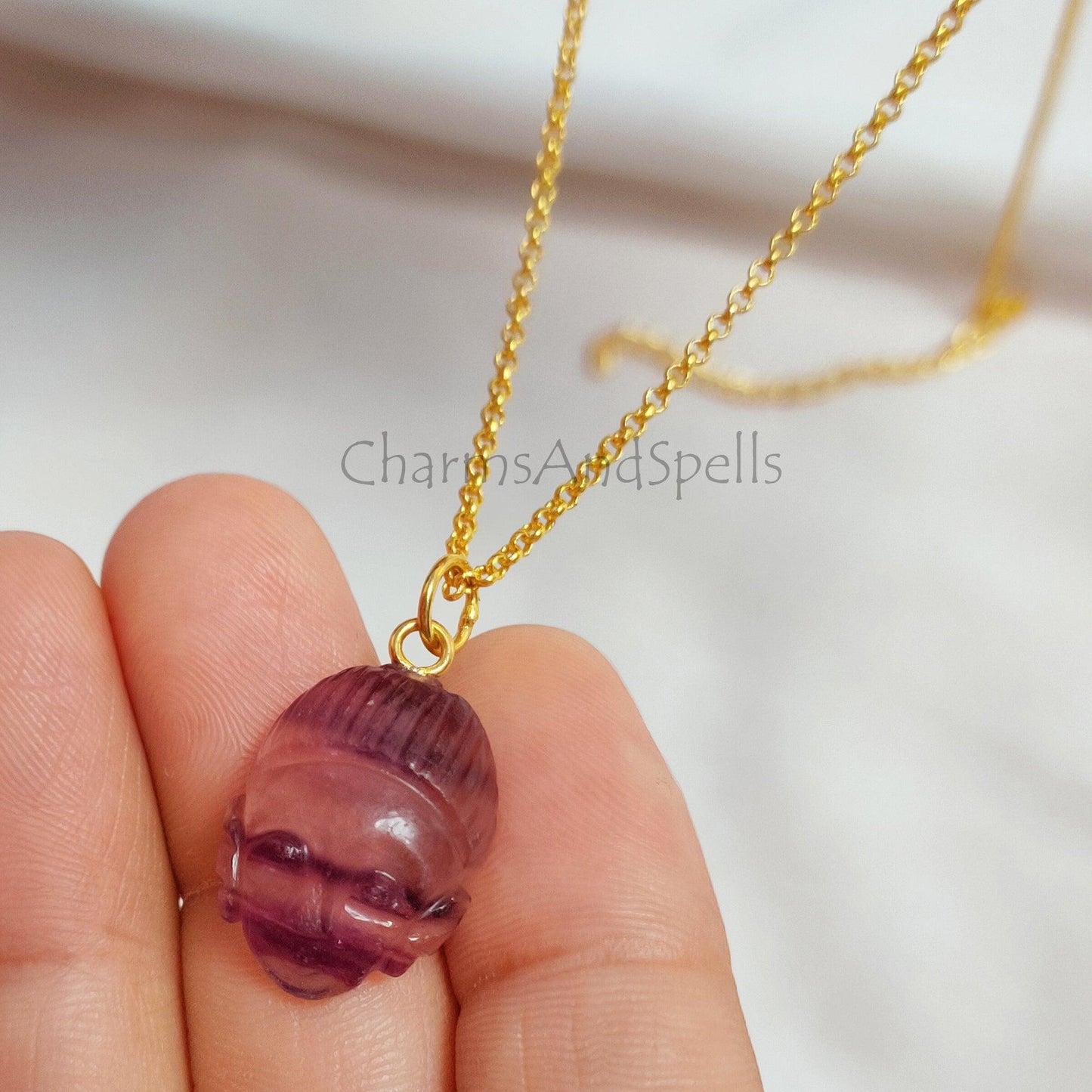 Fluorite Buddha Face Carving Pendant Necklace, Gold Plated Buddha Pendant, Fluorite Face Carving Gemstone Necklace, Healing Crystal Necklace - Charms And Spells